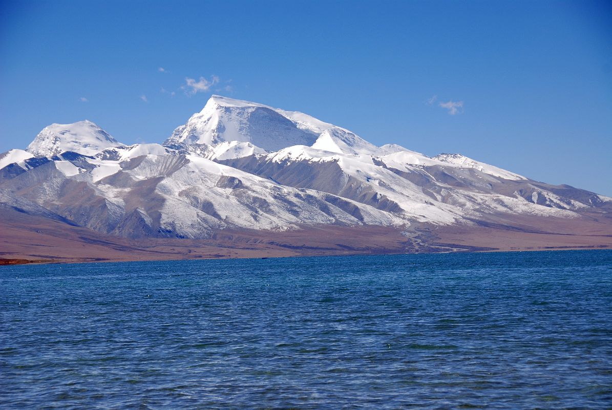 12 Gurla Mandhata And Lake Manasarovar From Seralung Gompa Gurla Mandhata (7728m) close up across Lake Manasarovar from Seralung Gompa.